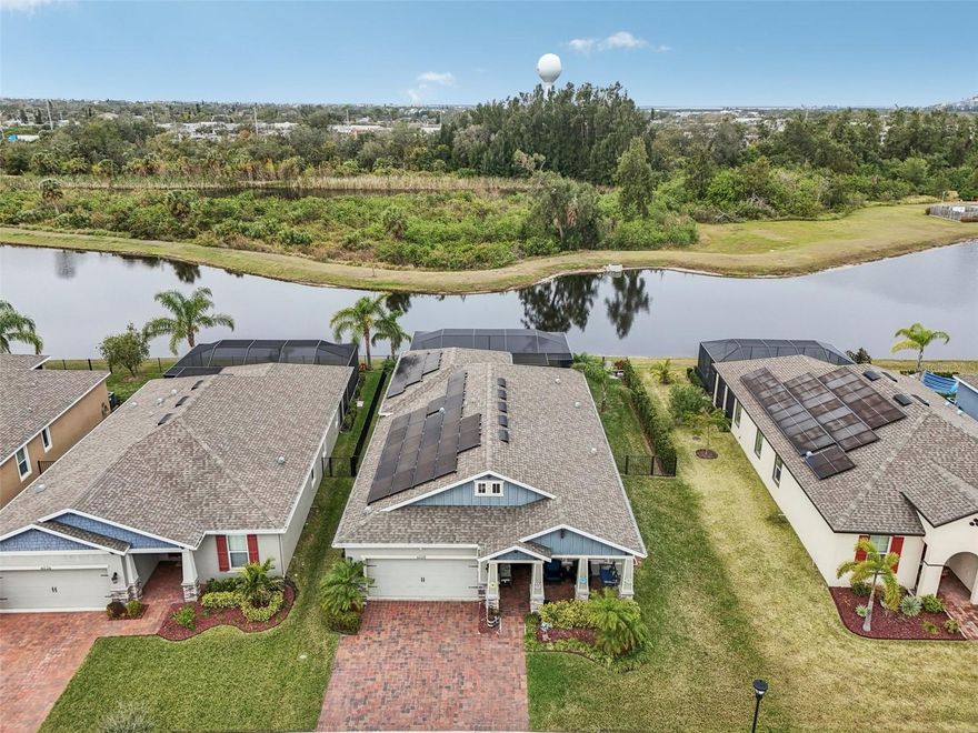 Welcome to this stunning 2,200+ sq ft pool home with SOLAR in the desirable Waterset community of Apollo Beach, FL. Offering an expansive
open-concept layout, this home combines space, style, and comfort and the benefits of solar and virtually not electric bill!!. With four spacious
bedrooms, a large den, and two full bathrooms, the home is designed to suit a variety of lifestyles, whether you are entertaining guests or
enjoying quiet time with the ones you love. The heart of the home is the beautiful kitchen, featuring top-of-the-line stainless steel appliances,
elegant granite countertops, a center island, and ample cabinetry for all your culinary needs. The kitchen seamlessly flows into the family room,
creating an ideal gathering space. Large windows and sliding glass doors throughout the home allow natural light to flood the living spaces,
creating a bright and airy atmosphere. The private primary suite is a luxurious retreat with a spa-like en-suite bathroom featuring dual vanities,
and a walk-in shower. Step outside to your backyard oasis, where a sparkling pool, large hot tub, and covered lanai are the perfect place to relax
and entertain. The fully fenced yard offers added privacy, making it an ideal spot for outdoor living. As part of the vibrant Waterset community,
you will enjoy resort-style amenities, including a clubhouse, fitness center, walking trails, and multiple pools. This home is in a prime location
near local shopping, dining, and top-rated schools and offers the best Florida living. With its perfect blend of comfort, luxury, and convenience,
this 2,500 sq ft pool home is ready for you to move in and start living the life of which you have always dreamed!