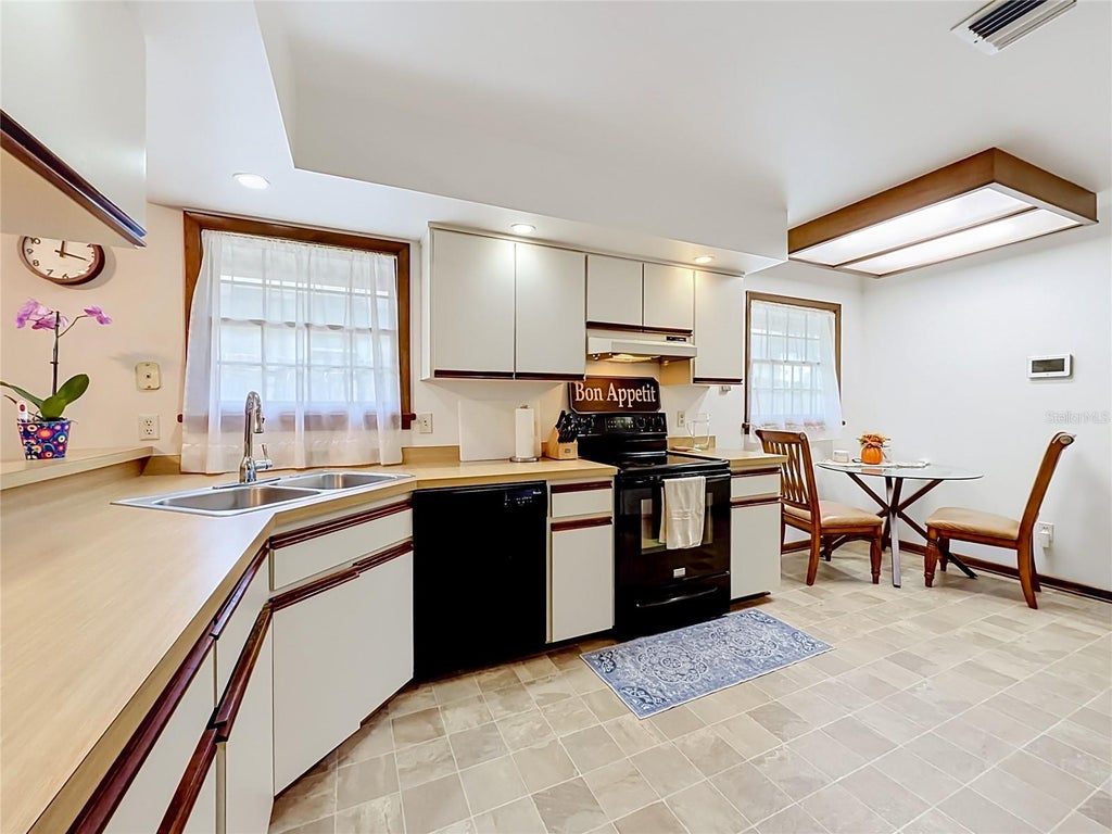 Photo of 7104 Bledsoe Avenue, Orlando, FL 32810 (MLS # O6437360)