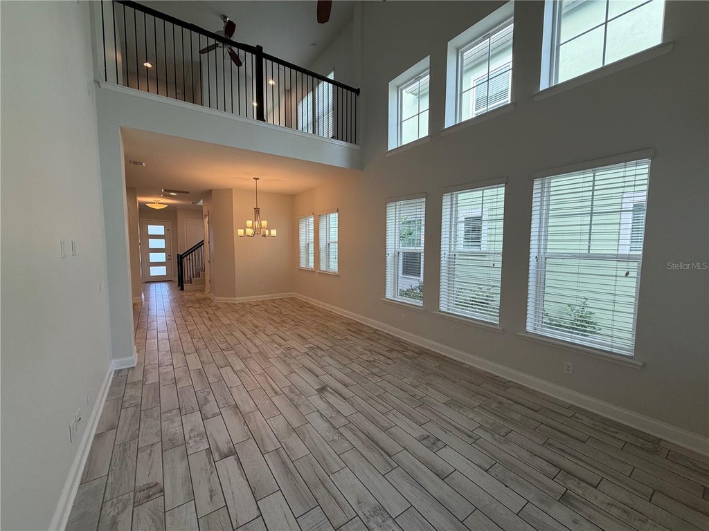 Photo of 7797 Laureate Boulevard, Orlando, FL 32827 (MLS # O6442009)