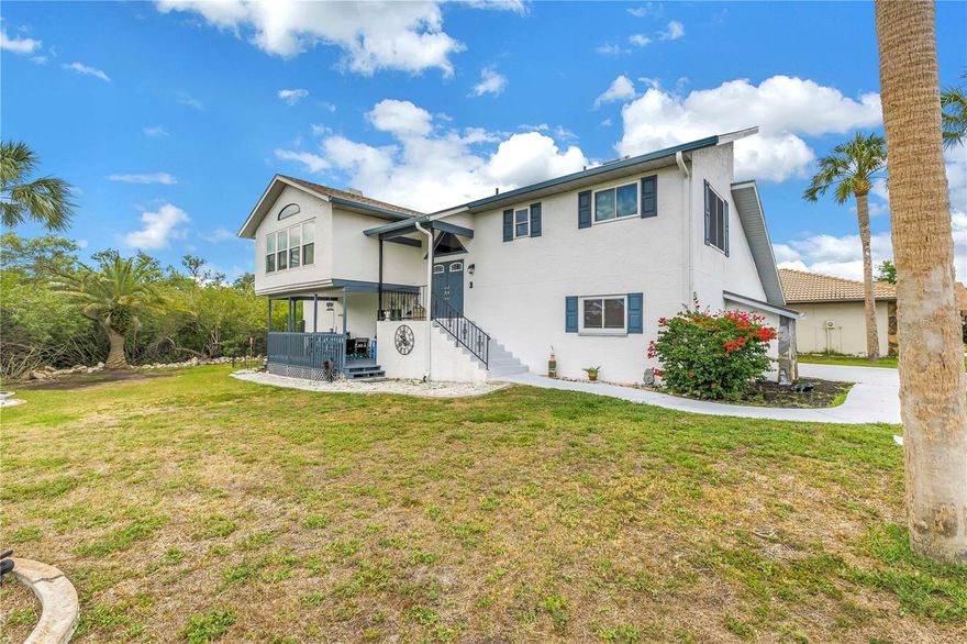 CHECK THIS OUT!!! Remodeled and Move-in Ready.  This exceptional New Port Richey home is tucked away on a quiet cul-de-sac and situated on a huge oversized lot offering nearly 4,000 square feet of usable space (over 2000 under air) Loaded with upgrades, the home features brand new luxury vinyl plank flooring, fresh interior and exterior paint, impact windows in parts of the house, custom doors to dual sunrooms, a NEW 2025 roof for years of worry-free living. 
The versatile floor plan offers endless possibilities with expansive living spaces designed for entertaining, multi-generational living, or working from home. A massive 18x30 downstairs bonus room can easily become a game room, home theater, media lounge, or anything your imagination can create. In addition, there are two extra flex rooms perfect for a home gym, art studio, office, hobby room, or additional guest space.  Car enthusiasts and storage lovers will appreciate the rare 4-car tandem garage with ample room for vehicles, golf carts, toys, and workshop space. Natural light pours throughout the home, highlighting the beautifully updated finishes and spacious layout.  The elevated main living space also provides piece of mind after the Hurricanes of ‘24. 
Located in the desirable Gulf Harbors area, residents also have the opportunity to join the Gulf Harbors Yacht Club and enjoy the incredible waterfront lifestyle the community is known for. Conveniently located near shopping, dining, parks, marinas, and Gulf beaches while still offering the privacy and tranquility of cul-de-sac living. This one-of-a-kind property delivers space, flexibility, and major upgrades all in one incredible package!