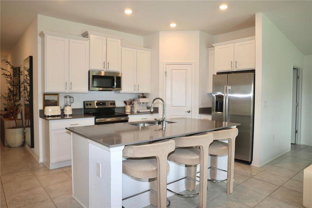 Photo of 1917 Cricket Cradle Drive, Kissimmee, FL 34746 (MLS # O6413261)