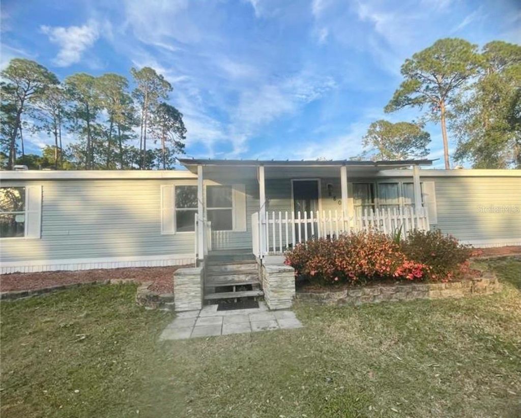 Photo of 8809 Treasure Island Road, Leesburg, FL 34788 (MLS # O6383720)