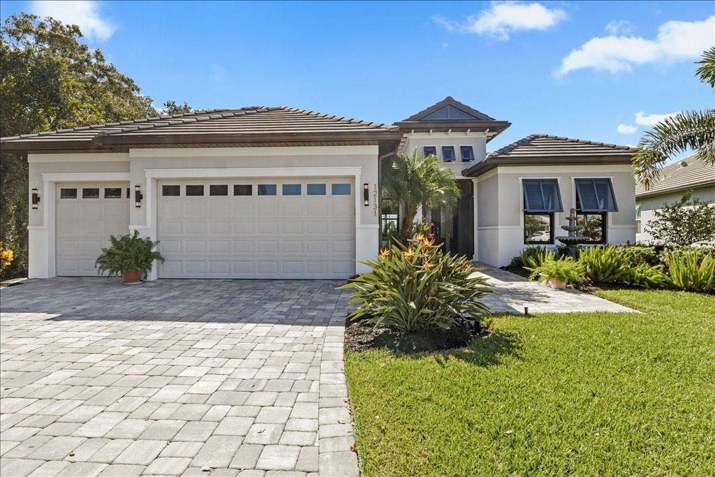 Photo of 12131 Bald Cypress Cove, Parrish, FL 34219 (MLS # A4664997)