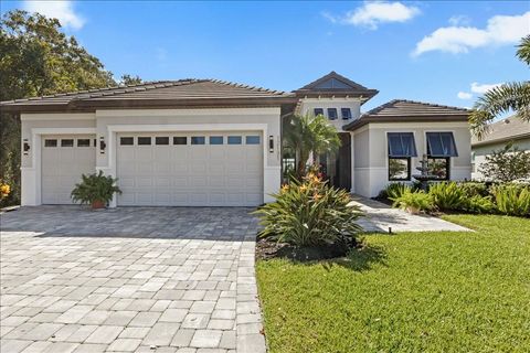 Photo of 12131 Bald Cypress Cove, Parrish, FL 34219 (MLS # A4664997)