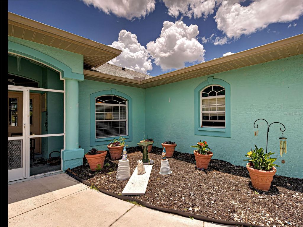 Photo of 2969 Wells Avenue, North Port, FL 34286 (MLS # C7511611)