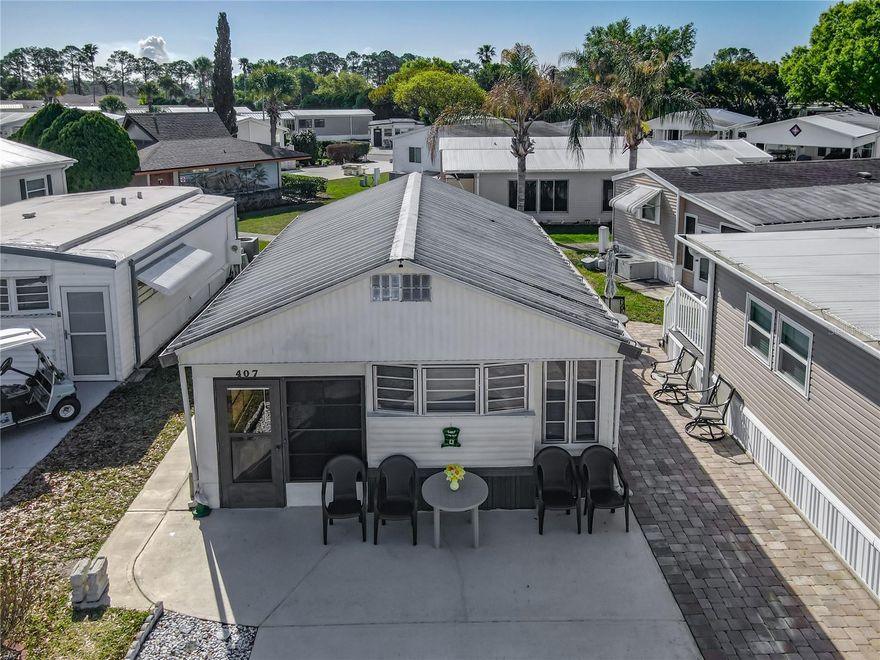 Charming home in a fantastic location at rear of community and backing to a common ground area & Bath House # 8. Absolutely perfect for when family and friends are visiting !! This 1978 home has been lovingly maintained by the current owners and benefits from a 29' x 8' vinyl room addition in 1986, spacious patio at rear of home, ample parking space and a metal roof. The home is being sold fully furnished and equipped as seen and is an absolute snip at just $64,900 !! This wonderful resort offers a 24/7 guard gated front entrance and private access to a 179 acre lake - beautiful Lake Davenport. Outdoor Resorts offers amenities such as 2 heated swimming pools, boat dock, golf course & 9 hole putt-putt golf, tennis, pickleball, a two story clubhouse for entertainment during various seasonal events & so much more....The Association fee is only $768.00 PER QUARTER! which includes all your amenities, in addition to Cable TV, Community heated pools, Park Manager, Mowing, Sewer, Water and Trash! Come and enjoy this fantastic, affordable lifestyle! Please remember 55+, no VA or FHA, 1 pet rule. The park benefits from being close to medical facilities, restaurants & grocery stores. Don’t delay!! Put this home on your ‘must see list’ and ask to arrange a viewing today! ****