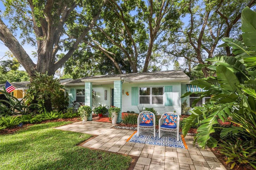 Located across from Hammock Park and just a block from the Pinellas Trail, this charming Dunedin coastal cottage offers the perfect blend of location, lifestyle, and peaceful retreat—all within the highly sought-after golf cart zone.

From the moment you arrive, you’ll feel the warmth and character this home offers. Inside, the bright open-concept layout flows effortlessly, creating an inviting space for both everyday living and entertaining. The updated kitchen features modern finishes, ample storage, and connects seamlessly to the main living areas.

Step outside and discover what truly sets this home apart. The backyard feels like a hidden oasis—surrounded by lush landscaping and a beautiful canopy of mature trees that create shade, privacy, and a sense of calm. Sunlight filters through the branches, making every moment outside feel peaceful and a little bit magical. Whether you’re enjoying your morning coffee, hosting friends, or unwinding in the evening, this space is something special.

Tucked within the yard is a charming shed, offering endless possibilities—perfect as a cozy home office, art studio, creative space, or your own private escape.

Major upgrades including a newer roof and hurricane impact windows provide peace of mind, making this home truly move-in ready.

Just a short golf cart or bike ride to Downtown Dunedin, you’ll enjoy easy access to waterfront sunsets, top restaurants, breweries, festivals, and everything that makes this area so desirable. With nature at your doorstep and the best of Dunedin just minutes away, this home offers a lifestyle that’s hard to match.

This is more than a home—it’s your own private retreat in the heart of Dunedin.