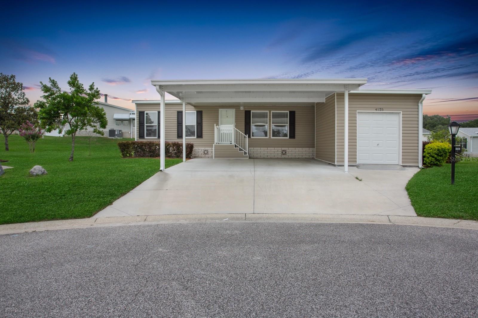 This practically NEW 2021 Built 3/2 Split plan home is located on a quite cul-de-sac in Prestigious Zellwood Station 55+ Golf Community. PET APPROVED. Open Living/Dining/Kitchen & Island are perfect for relaxing and entertaining, then walk out onto to the Screened back porch.
New Roof 2021,New A/C 2021. Main Suite is spacious with en-suite, double vanity/shower/tub. PLUS 2 Guest rooms with great closet storage. Kitchen has gorgeous cabinets and kitchen island. Inside Laundry room with Newer Washer/Dryer. Tons of Storage. Golf Cart Garage with Extra Storage next to Double Carport. One of the4 pools is just a short golf cart ride away, then relax at the Full Service Whistlestop Bar & Restaurant. Entertainment every Friday night! Tons of activities for an active lifestyle. Come enjoy the "Good Life". Schedule an appointment today!