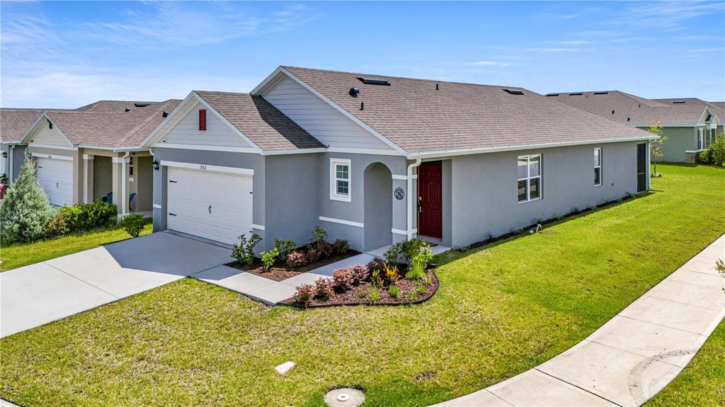 Photo of 1702 Walnut Creek Drive, Kissimmee, FL 34744 (MLS # O6432588)