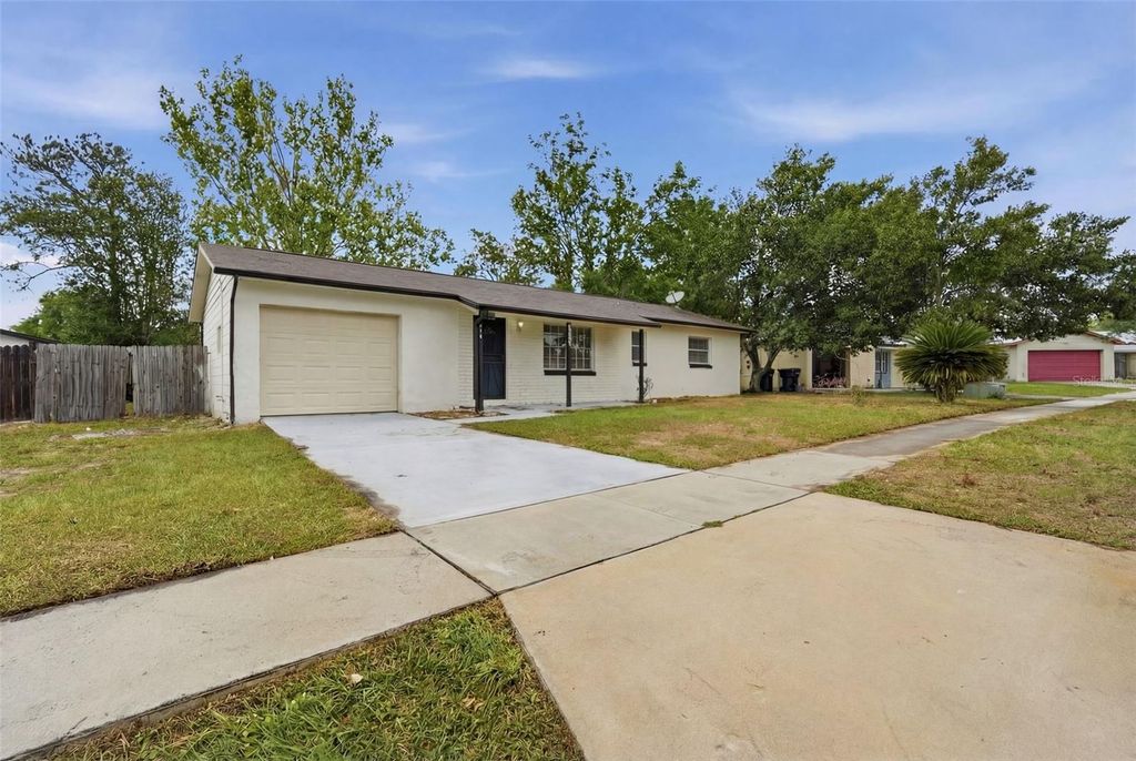 Photo of 1710 Tallo Way, Orlando, FL 32818 (MLS # O6397199)