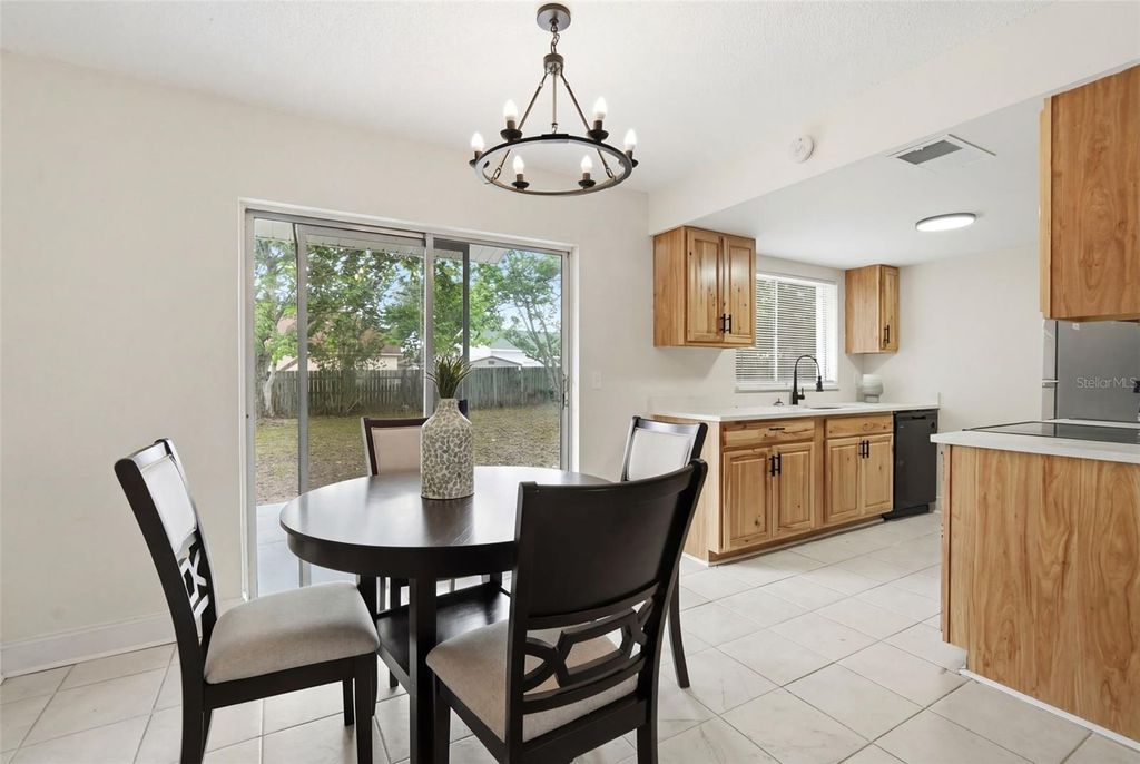 Photo of 1710 Tallo Way, Orlando, FL 32818 (MLS # O6397199)