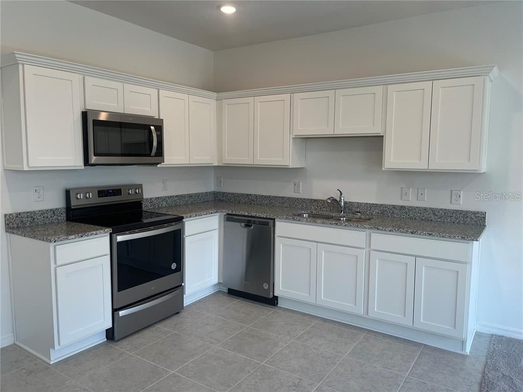 Photo of 497 Madison Drive, Davenport, FL 33837 (MLS # O6389032)