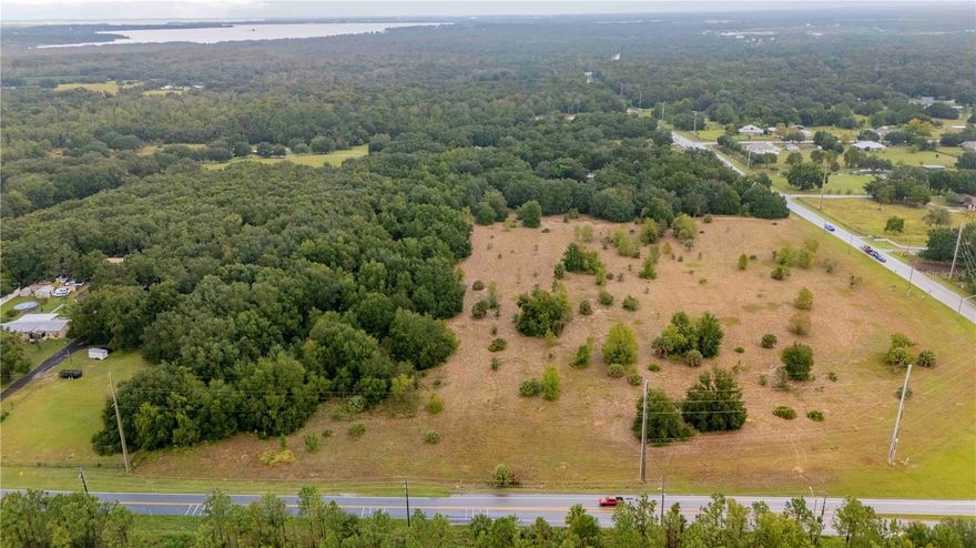 This 3.5 Acre Parcel is one of 3 adjacent properties at the round about of CR 455 and CR 561 in Lake County. This perfect 3.5 acre parcel is ready for you to build your to build your dream home on it. You can have horses. The lot has a wooded area and an open area to build your home on. You can purchase it with the other 2 lots and have an amazing 18.5 acres to build your very own Horse Ranch. A builder can take the 18.5 acres and create a custom home community with million dollar homes on 1.5 acre or more lots and develop it into a small gated community. So many options to consider. The land is only 2 miles from the Florida Turnpike. Orlando, the Disney and Universal parks and Mall of Millenia are all within a 20 minute drive. So many places to do things. The land is flat and high and dry. You have access to local hospitals, dozens of shopping centers, restaurants, country clubs, food stores, and retail establishments of all kinds. The Atlantic beaches are only 50 miles east off of I-4 or the East West Highway. There are hundreds of Lakes and Parks in Lake County for recreation. So much to do so little time to do everything. This is an opportunity of a life time to have the best possible place to live in Central Florida.