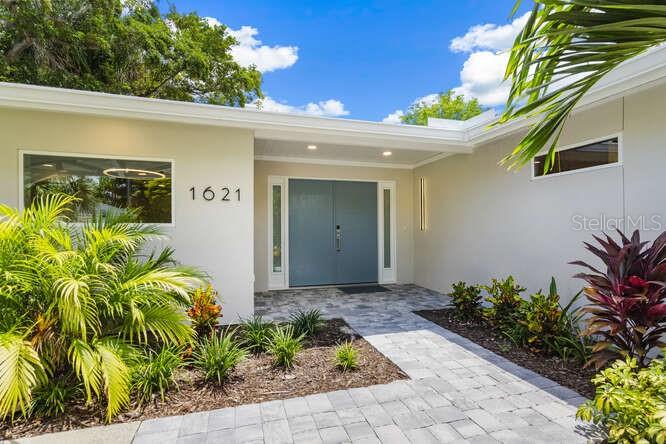 Total Renovation is now complete with the addition of a new roof installed at the end of June. And the seller says all offers will be given serious consideration for this beautiful home nestled on a picturesque lot at the end of a private road in the coveted West of Trail area adjacent to Oyster Bay. This stunning residence offers the perfect blend of classic Florida charm and modern sophistication. Boasting three spacious bedrooms and three luxurious bathrooms, this residence has been impeccably renovated to meet the highest standards of today’s buyers. The heart of the home is the chef’s kitchen, designed with premium appliances, sleek countertops, and ample workspace for culinary enthusiasts. The open living spaces flow seamlessly to the outdoors, where a sparkling pool awaits, surrounded by lush landscaping that creates a private oasis. Pristine and storm-resilient, this home offers peace of mind along with an incredible opportunity to live in one of Sarasota’s most sought-after neighborhoods—all at an attractive price. Don’t miss this rare gem!