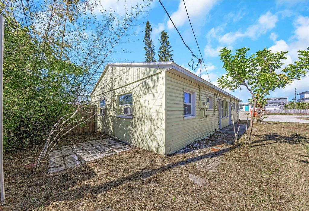 Photo of 197 148th Avenue E, Madeira Beach, FL 33708 (MLS # TB8475687)