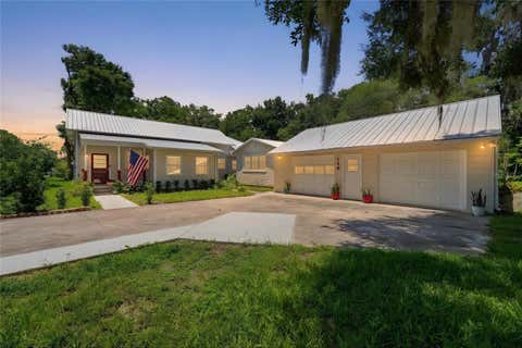 Photo of 128 N Lakeview Drive, Lake Helen, FL 32744 (MLS # V4949744)