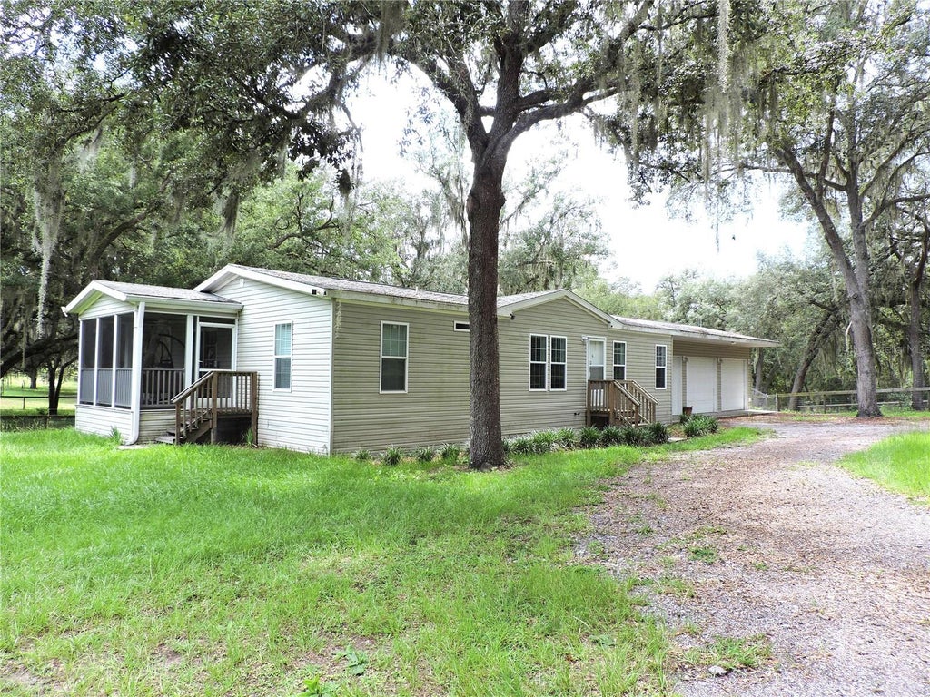 Photo of 29248 Wildlife Lane, Brooksville, FL 34602 (MLS # W7887043)