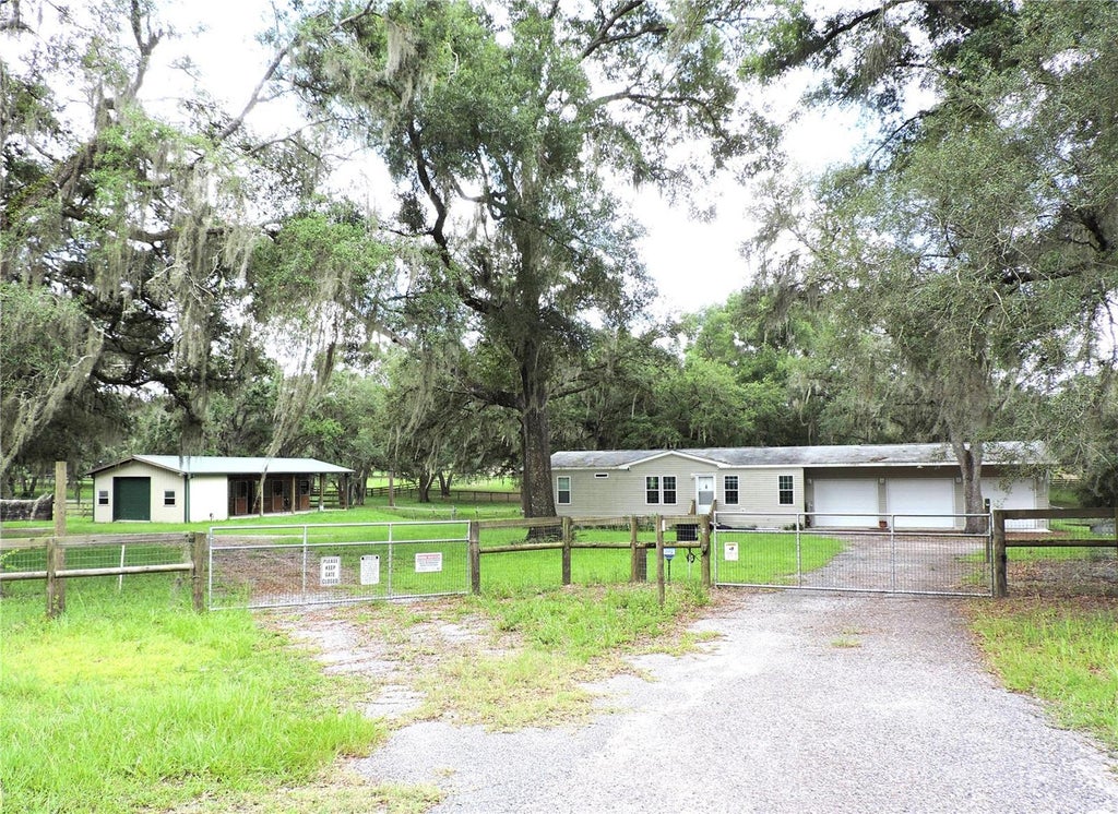 Photo of 29248 Wildlife Lane, Brooksville, FL 34602 (MLS # W7887043)