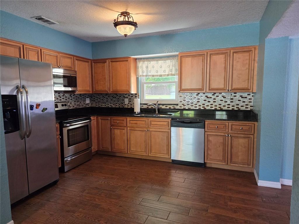 Photo of 5814 20th Ave S, Gulfport, FL 33707 (MLS # TB8491127)