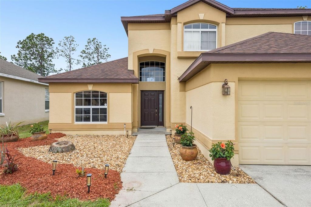 Photo of 726 Oxford Drive, Davenport, FL 33897 (MLS # O6417236)