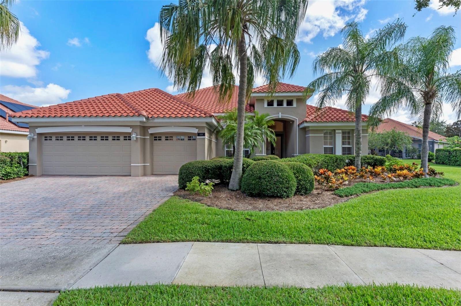 One or more photo(s) has been virtually staged. Welcome to this beautifully maintained 4-bedroom, 3-bathroom home located in the highly desirable gated community of Reserve at Belmere. Sitting on an oversized 0.31-acre lot, this home offers a thoughtfully designed layout with an office, formal living room, formal dining room, and a spacious family room—perfect for both entertaining and everyday living. The large kitchen features ample cabinet space and a center island, ideal for meal prep and hosting. Throughout the home, you'll find upgraded louvre window treatments that enhance both style and function. The primary suite offers a private retreat with an ensuite bathroom that includes dual vanities, a soaking tub, glass-enclosed shower, and two generous walk-in closets. Additional features include a dedicated laundry room with built-in storage and a utility sink, a spacious 3-car garage offering plenty of room for vehicles and extra storage, and outdoor private security cameras for added peace of mind. A newer tile roof installed in 2019 adds even more value. Residents of The Reserve at Belmere enjoy access to top-tier amenities just a short walk away, including a lakefront park and pier on Lake Whitney, playground, fitness center, tennis courts, basketball court, and sand volleyball. Conveniently located near Winter Garden Village, shopping, dining, and major highways including SR 50, SR 429, and the Turnpike, this home offers the perfect blend of comfort, community, and convenience. Don’t miss this incredible opportunity to live in one of Windermere’s most sought-after communities—schedule your private showing today!