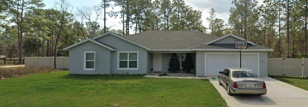 Photo of 12878 SW 76th Lane, Dunnellon, FL 34432 (MLS # O6429104)