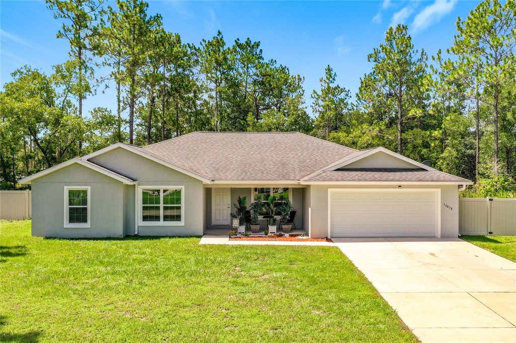 Photo of 12878 SW 76th Lane, Dunnellon, FL 34432 (MLS # O6429104)