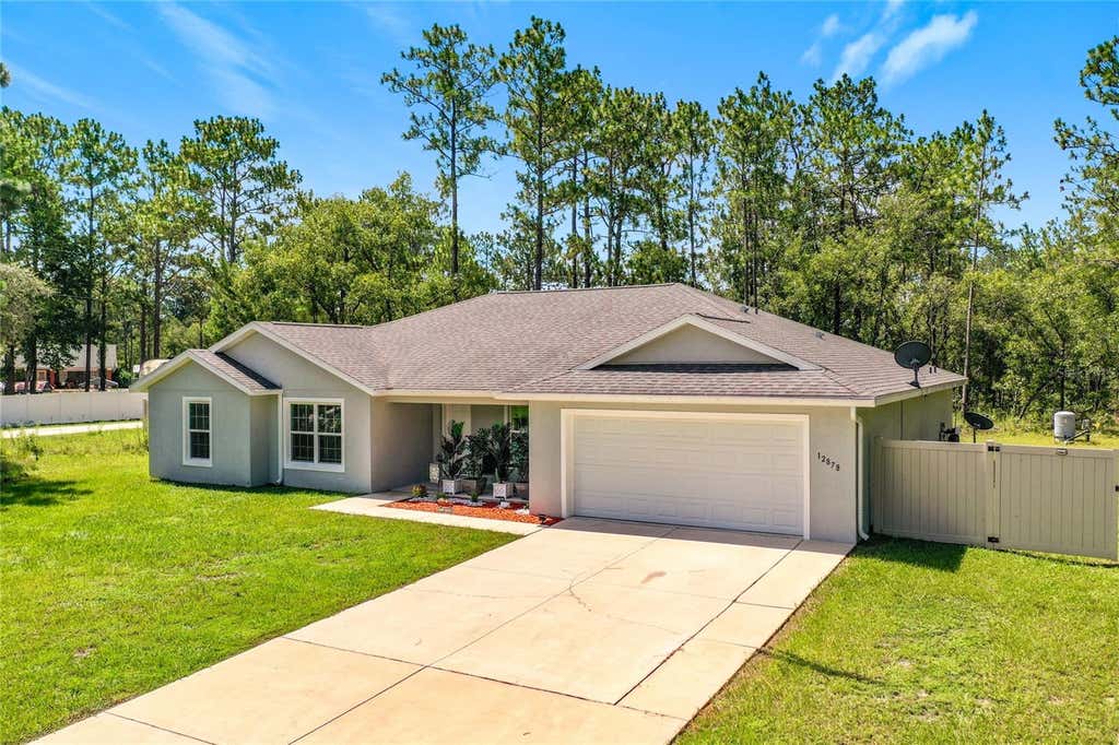 Photo of 12878 SW 76th Lane, Dunnellon, FL 34432 (MLS # O6429104)