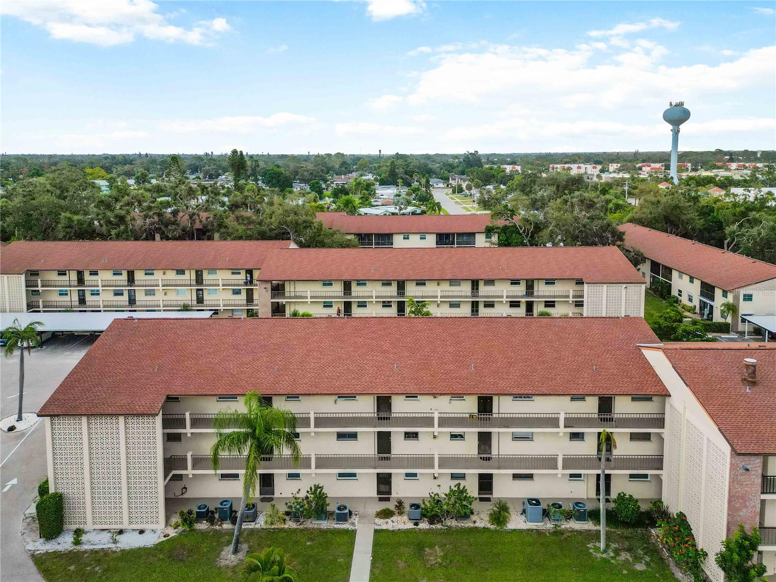 RARELY AVAILAIBLE 3-BEDROOMS . . . END UNIT . . . ACROSS FROM THE ELEVATOR . . . AND just minutes from Siesta Key Beach and walkable to Gulf Gate for all the shopping, entertainment and dining you could want. This bright open split floor plan is spacious and would be a great year-round home or seasonal retreat. The primary suite is a large area with a walk-in closet and en-suite bath while the two additional bedrooms provides plenty of space for your guests, hobbies or home office. Tregate Manor is a 55+ community offering a heated community pool, covered reserved parking, small workout area, BBQ spaces and beautiful landscaped grounds. This condo is conveniently located across from the elevator for convenience. This is your chance to own a piece of paradise and one of the very few 3-bedroom residences in this sought after community where the location is unbeatable. HOA fees are in negotiations to be reduced by the end of the year. Currently $581 a month includes basic cable, internet, water, sewer, trash, recycling, exterior insurance, exterior pest control and all for one low price. The only things you need to add is electricity and content insurance. All information provided by the sellers is deemed reliable but is not guaranteed. Buyers are encouraged to verify all information independently.
