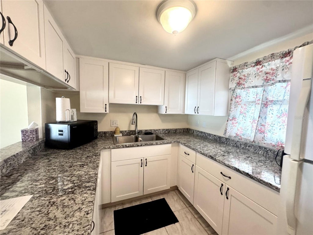 Photo of 7701 Starkey Road #638, Seminole, FL 33777 (MLS # TB8549005)