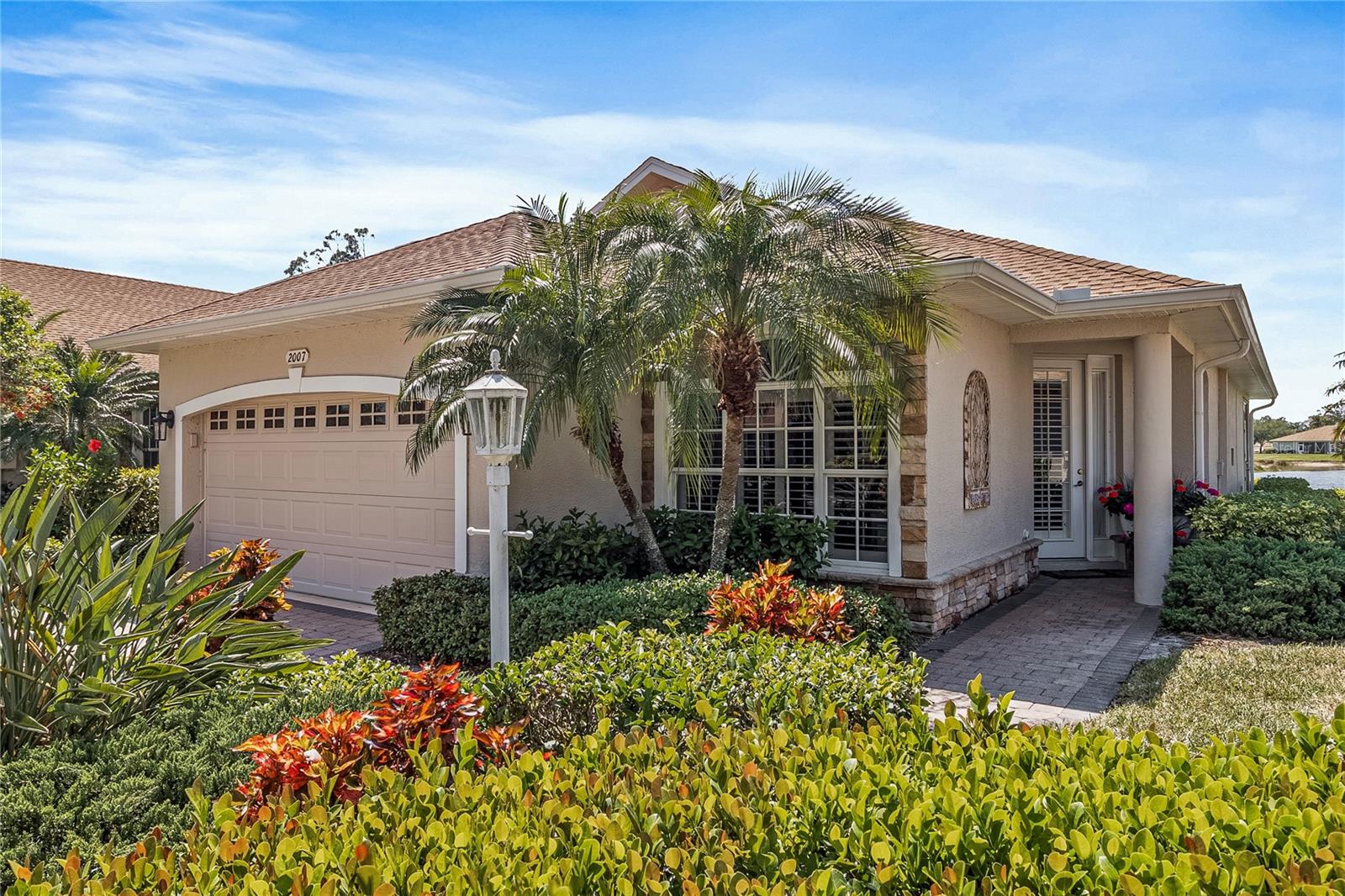 Perfect short term option full of AMENITIES as this home is open now through the end of November. This beautifully maintained carriage home is an ideal offering for those building locally or looking to assimilate before making their own home purchase. The novelty of freestanding without shared walls. Located in the aesthetically pleasing community of Lakeside Plantation, the convenience of location cannot be understated. Follow the tree hugged roads with blooming flowers to your welcoming abode. Meticulously cared for, both inside and out, this turnkey residence offers all the modern conveniences of home. Leave all your belongings packed and keep the transition minimal. The floor plan is comfortable and accommodating and decorated with tasteful décor. Kitchen serves as the hub of your living space. Open and modern with a separate dining nook for casual occasions. Formal dining option at the table with seating for six. The primary suite features queen sized accommodations in a spacious, classic setting. His and her sinks, step in shower and walk in closet all allow for easy space sharing in the en-suite bathroom. Soak your cares away and catch up on your favorite television series in the garden tub. Get a good night's rest in the comfortable, queen sized bed in the guest room. The DEN works well as an OFFICE and features a casual sitting area. Open the sliding doors to a beautifully styled lanai with glass windows. A tranquil sanctuary to unwind at the end of the day looking upon the gorgeous WATER VIEW where nature abounds. Interior washer and dryer in a dedicated laundry room. Our guests are welcome to utilize the vast array of community amenities. The carriage homes feature a PRIVATE POOL that is just a short walk away. Additionally the main clubhouse has an OLYMPIC SIZED POOL & SPA, FITNESS CENTER, tennis courts, PICKLEBALL courts, and playground. Active and friendly community where your neighbor's will smile and wave as they walk, jog, bike or skate by. Rent includes lawn, landscape and full amenities. Cancel the gym membership because all is on site. Please call to make an appointment for your private showing.