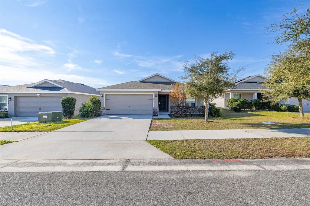 Photo of 690 Persian Drive, Haines City, FL 33844 (MLS # O6384992)