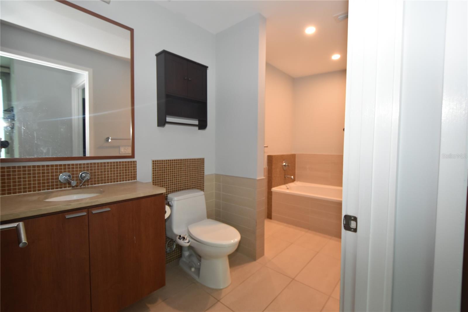 THE PLACE AT CHANNELSIDE A CON - Residential