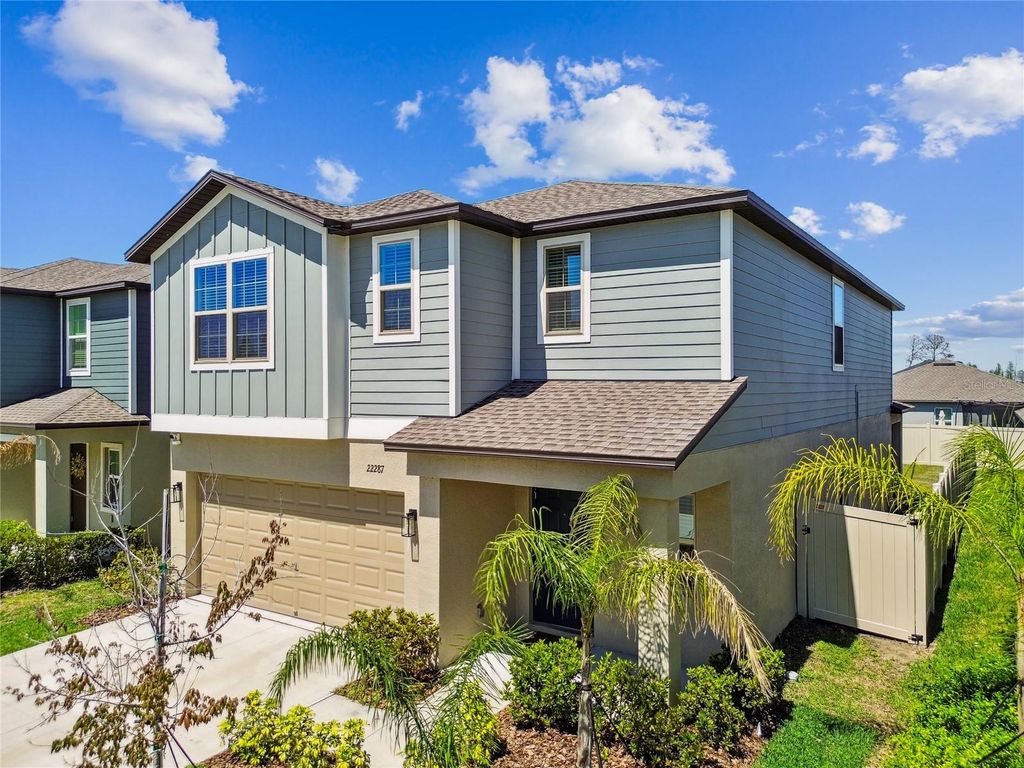 Photo of 22287 Storybook Cabin Way, Land O Lakes, FL 34637 (MLS # TB8365794)