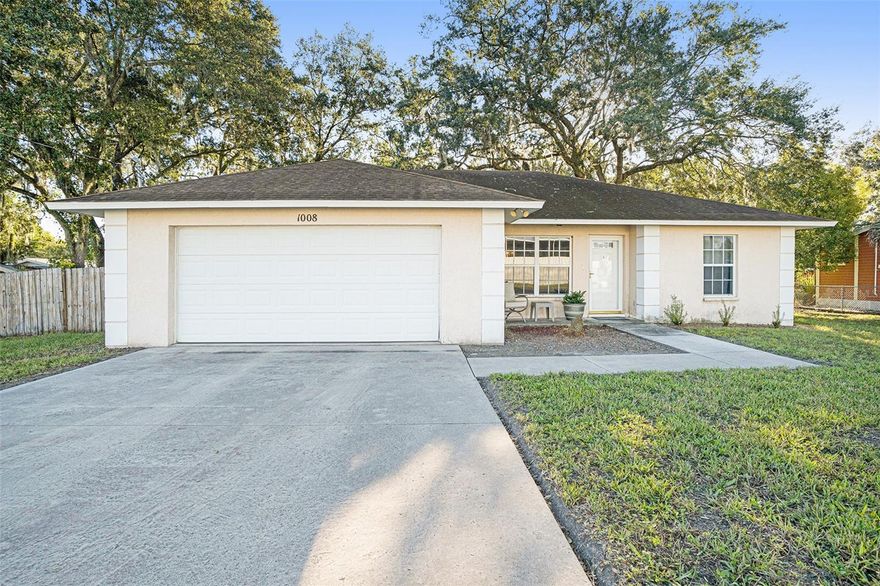Welcome to 1008 N Shannon Ave, a charming and meticulously maintained 3-bedroom, 2-bathroom home nestled in the heart of Plant City, FL. This delightful residence boasts 1,435 square feet of living space, offering a perfect blend of comfort, style, and functionality.

As you step inside, you are greeted by an inviting atmosphere filled with natural light, courtesy of well-placed windows that illuminate the entire space. The open-concept living area seamlessly connects the spacious living room, dining area, and kitchen, creating an ideal setting for entertaining friends and family. The kitchen is a chef's dream, featuring modern appliances, ample counter space, and plenty of storage, making meal preparation a breeze.

The master suite is a serene retreat, complete with a generously sized bedroom, a walk-in closet, and a private en-suite bathroom. The two additional bedrooms are equally comfortable, providing plenty of space for relaxation and personalization. The two well-appointed bathrooms feature modern fixtures and are designed for both convenience and luxury.

Outside, the property offers a beautifully landscaped and fenced yard, providing a peaceful oasis for outdoor activities and gatherings. Imagine enjoying your morning coffee on the patio or hosting barbecues in the evenings – the possibilities are endless.
 this home is conveniently situated near local schools, parks, shopping centers, and dining establishments, ensuring you have everything you need within reach. With easy access to major highways and public transportation, commuting to nearby cities is a breeze.

Don't miss the opportunity to make this house your home. Schedule a showing today and experience the charm and comfort of 1008 N Shannon Ave, where modern living meets timeless elegance. Your dream home awaits!