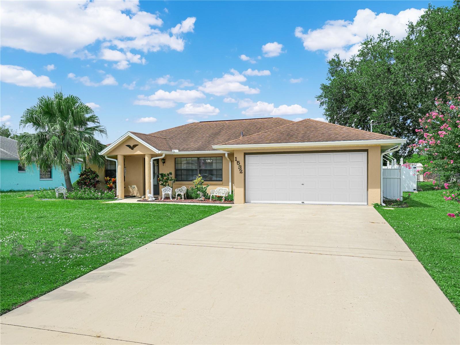 Welcome to 1532 Sycamore Avenue, a charming and beautifully maintained single-family home located in the heart of Lake Placid, Florida. Featuring a new roof installed in 2016 and a brand new air conditioning system added in 2022, this home offers peace of mind and modern comfort from the start making it ideal for those looking to enjoy peaceful Florida living with the potential for added income or multi-generational flexibility. From the moment you arrive, you’ll be captivated by the home’s inviting curb appeal, lush landscaping, and well-manicured front lawn. Step inside to discover a warm and welcoming interior that exudes cottage-style charm with tasteful updates throughout. The spacious open-concept kitchen and dining area features bright cabinetry, a modern appliance suite, a large breakfast bar island with granite countertops, and whimsical pendant lighting that brings a cheerful elegance to the space. The adjacent living room offers an equally inviting ambiance with neutral tile flooring, natural light streaming through wide windows, and a cozy decorative fireplace that anchors the room perfectly for relaxed evenings. The layout is both practical and cozy, boasting three comfortable bedrooms and two full bathrooms. The primary suite includes an en-suite bathroom with a large vanity, private shower, and ample storage space. The guest bathroom is styled with vintage flair, offering a granite countertop and a whimsical floral theme that adds to the home’s overall personality. French doors off the dining area lead out to the backyard, where you'll find a true hidden gem: an oversized detached shed equipped with electricity. With a little creativity, this flexible space can be transformed into a charming mother-in-law suite, a serene home office, or a short-term rental that generates extra income. The backyard itself is fully fenced and spacious enough to accommodate pets, gardening, or entertaining guests under the shade of mature trees. There is also an above-ground pool ready for warm summer days and weekend fun. Whether you're looking for a full-time residence, a seasonal retreat, or a property with income-producing potential, this home delivers on all fronts. Ideally located just minutes from the quaint downtown area of Lake Placid, known for its vibrant murals and small-town hospitality, this property offers easy access to dining, shopping, and recreation. Enjoy nearby favorites like Jaxson’s on the Lake, Morty & Edna’s Craft Kitchen, and Main Street America Bistro. Outdoor lovers will appreciate the proximity to Lake June-in-Winter for boating and fishing, as well as Highlands Hammock State Park for nature hikes and picnics. You’re also within convenient reach of larger towns like Sebring and Avon Park, just a short drive away. The home is about 90 minutes from both Fort Myers and Sarasota beaches, making weekend coastal getaways a breeze. The nearest major airports are Southwest Florida International (RSW) and Orlando International (MCO), both accessible for travel needs. Additionally, AdventHealth Lake Placid provides nearby healthcare services and peace of mind. This home truly has it all—charm, space, flexibility, and location. Don’t miss your opportunity to make 1532 Sycamore Avenue your Florida dream come true.
