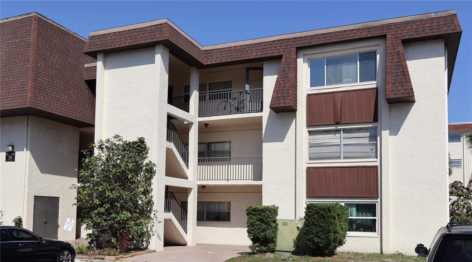 2nd floor updated condo just off of 4th Street in St Pete. The building has steps and an elevator to access the second floor.
* Building has a brand new roof installed in June 2025
* Condo has a new AC unit installed in November of 2024
* All assessments paid in full
* Brand new stainless steel appliances
Upon entering you are in the spacious living room with lots of natural light. There is all new vinyl plank flooring throughout the condo and all freshly painted.
The kitchen is open to the living room with a counter height bar that seats 3 adults. Kitchen has shaker cabinets, granite counter tops and brand new stainless steel refrigerator and glass top range.
Walk down the hall to find both bedrooms. The master bedroom has a walk in closet and a private bath. The second bedroom is equally spacious. The full bath has a walk in shower, pedestal sink and there is a linen closet for the full bathroom.
Both bedrooms have sliding glass doors that lead to an enclosed porch/sunroom. Looking out the windows from the sunroom you can see the community pool right behind the condo. There is also a large storage closet in the sunroom.
There is washer and dryer just a few steps down the breezeway on the 2nd floor. Dedicated parking spot and ample guest parking for a second vehicle.
Conveniently located only 8 minutes north of downtown St Pete. Easy access to Gandy bridge and I-275. Location is close to all the shopping, food and pubs that 4th Street has to offer. Only 20 minutes to gorgeous St Pete beaches.