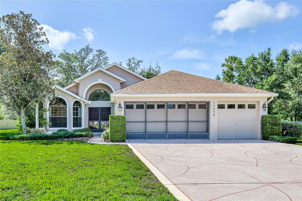 Photo of 11430 Kingstree Court, Spring Hill, FL 34609 (MLS # W7887960)