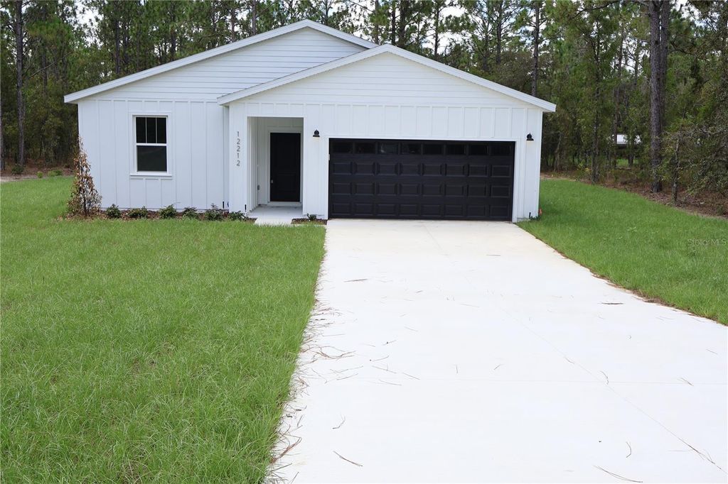 Photo of 12212 SW 90th Place, Dunnellon, FL 34432 (MLS # O6322550)