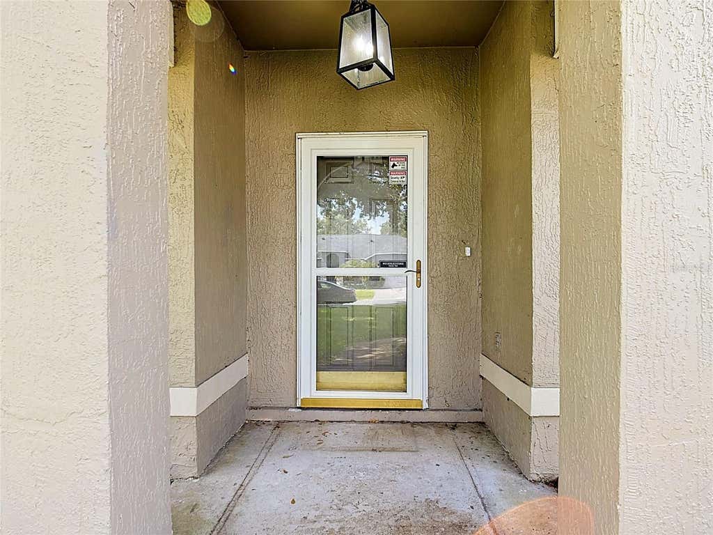 Photo of 227 Robbins Rest Circle, Davenport, FL 33896 (MLS # O6429638)