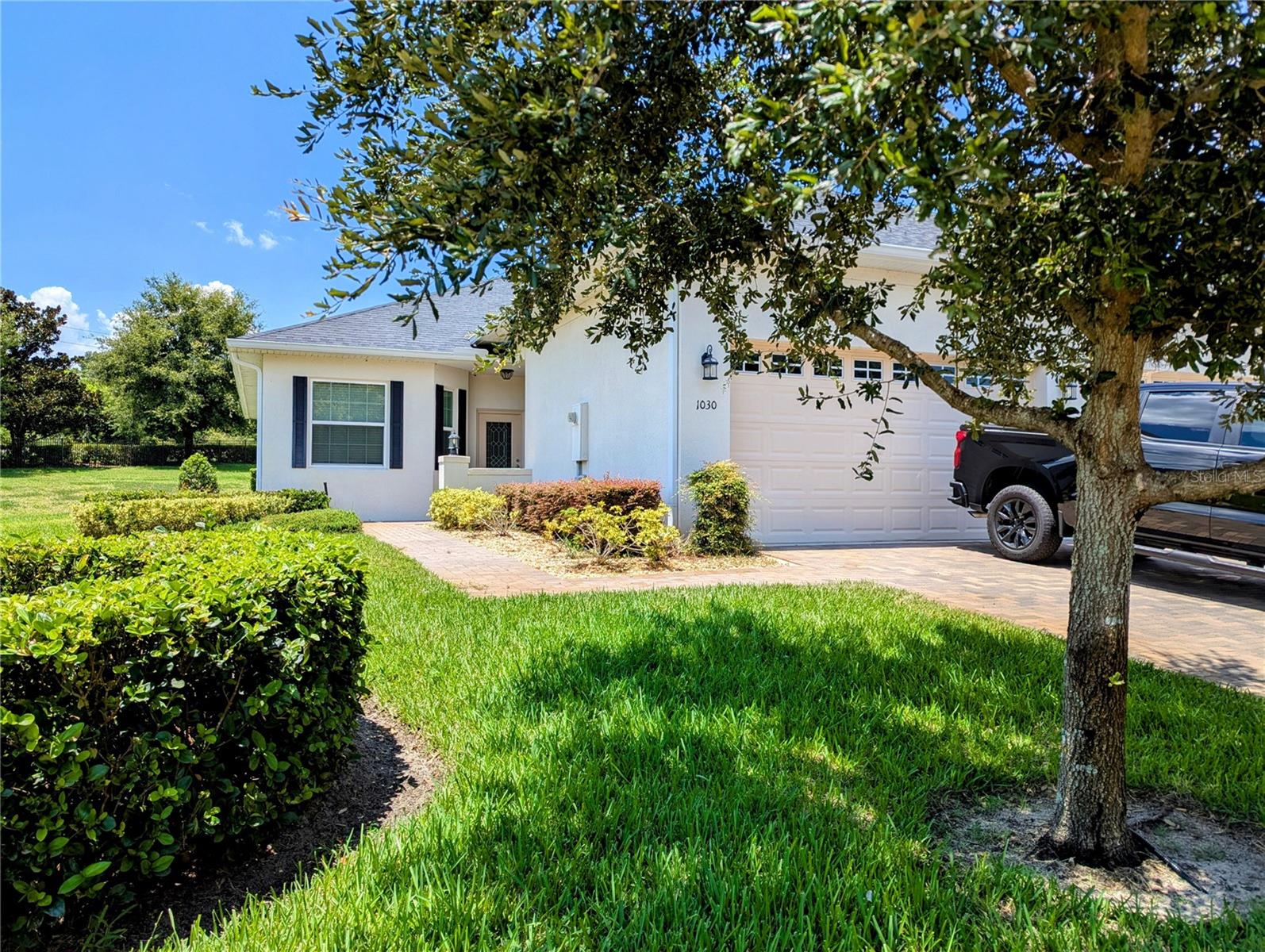 Welcome Home! This gem is a rare find. A 3 bedroom 2 bath unit in the gated community of Green Gate, with a two car garage. This home has been well-loved and is in beautiful, move-in-ready condition. The kitchen has a huge bar, perfect for sitting down and grabbing a snack or prepping for dinner. The open floor plan is perfect for watching the big game or family game night. The bedrooms area nicely sized and the laundry room is huge! This home also features a screened in patio and no rear neighbors. It's also an end unit and one of the few 3 bedrooms in the community. Homes in this community move very quick, so do not wait! Schedule your showing today!!!
