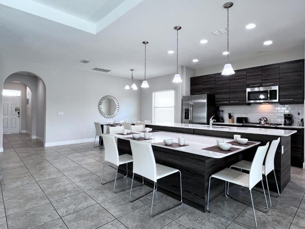 Photo of 140 Angelas Avenue, Haines City, FL 33844 (MLS # O6447519)