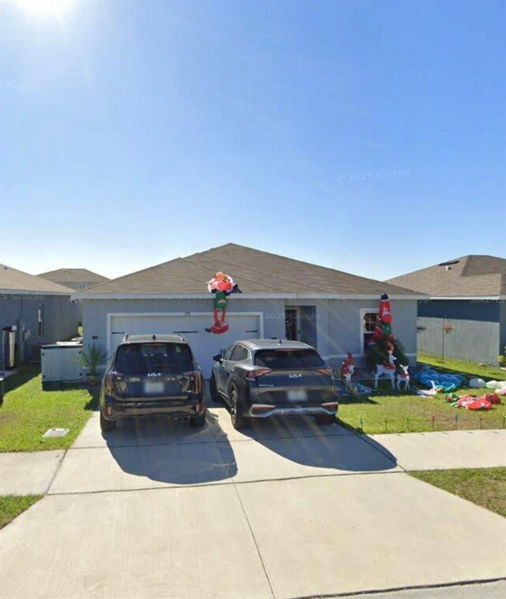 Welcome to this beautifully maintained 4-bedroom, 2-bath home located in a desirable Haines City neighborhood. This property offers a perfect blend of comfort, style, and energy efficiency. The open-concept floor plan features a modern kitchen with granite backsplash, ample counter space, and a seamless flow into the dining and living areas—ideal for entertaining and everyday living.
Upgrades include solar panels with a monthly payment of $180, impact doors for peace of mind, and a custom-built closet in the primary suite for exceptional storage. The backyard is fully fenced and features low-maintenance artificial turf, perfect for relaxing or play.
Conveniently located near shopping, dining, and major highways, this home is move-in ready and waiting for its new owners. Schedule your showing today!