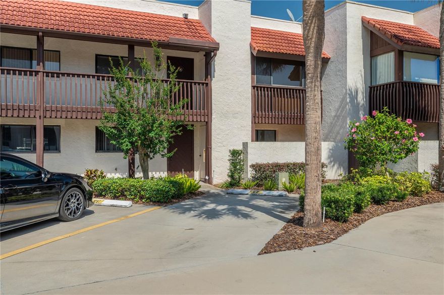 Lake Wales Country Club! Motivated Seller! New Price on this Ground floor 2 BR/ 2 BA condo close to clubhouse and pool area plus parking space is right at your front door. Open floor plan with a fully equipped kitchen with solid wood cabinets and SS appliances, Washer /dryer included. Split bedroom plan for privacy plus both bathrooms have been completely renovated. New hot water heater 2025. Primary bedroom has large walk in closet.  Spacious 9 x 22 screen porch overlooks lagoon. Great for year round living or a winter retreat. Relax and enjoy the Florida lifestyle. 
Convenient central Florida location approximately an hour and a half to either coast Tampa or Vero Beach. Close to hospital, shopping, gym and parks.