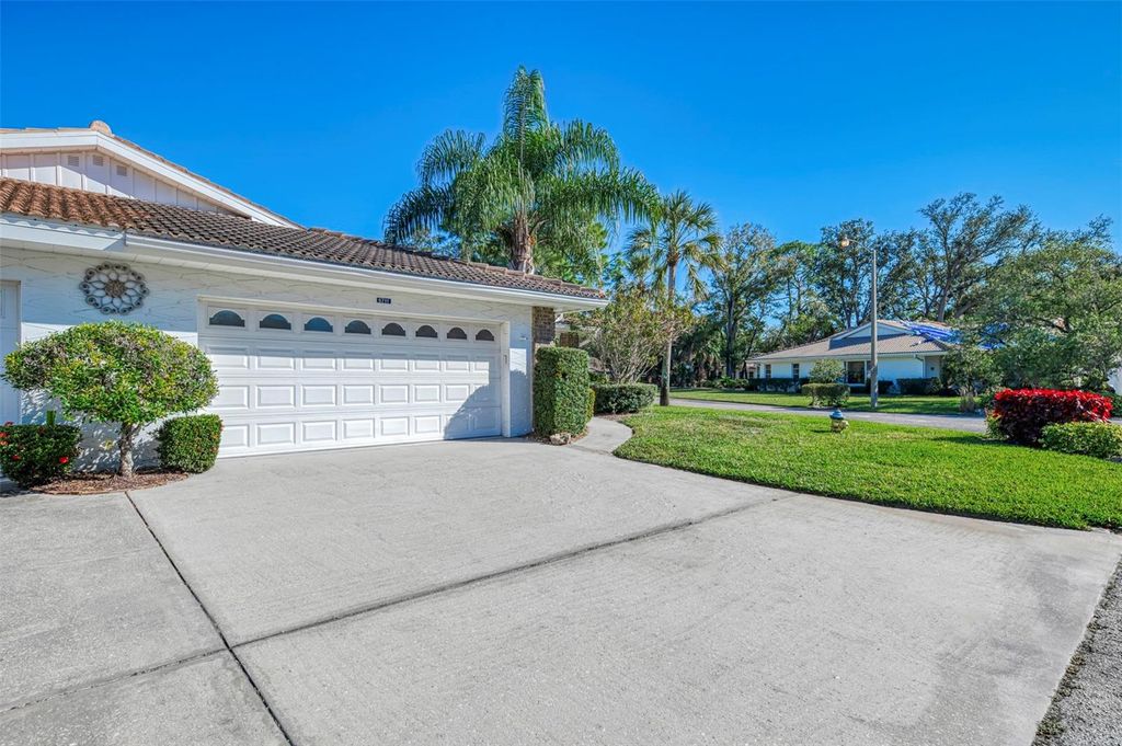 Photo of 5711 Garden Lakes Palm, Bradenton, FL 34203 (MLS # A4685053)
