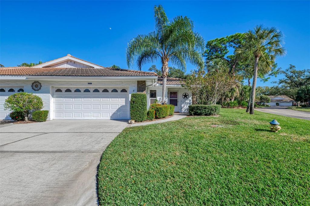 Photo of 5711 Garden Lakes Palm, Bradenton, FL 34203 (MLS # A4685053)