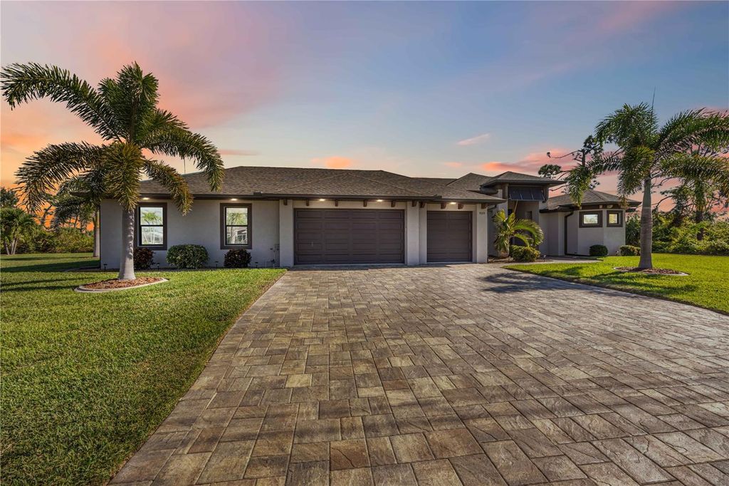 Photo of 959 Boundary Boulevard, Rotonda West, FL 33947 (MLS # D6144747)