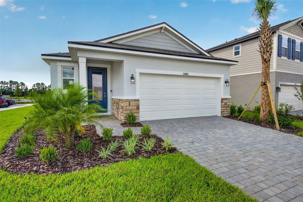 Photo of 34880 Arbor Retreat Drive, Dade City, FL 33525 (MLS # TB8499680)