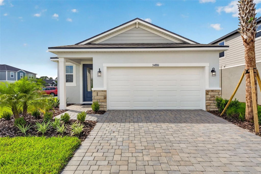 Photo of 34880 Arbor Retreat Drive, Dade City, FL 33525 (MLS # TB8499680)