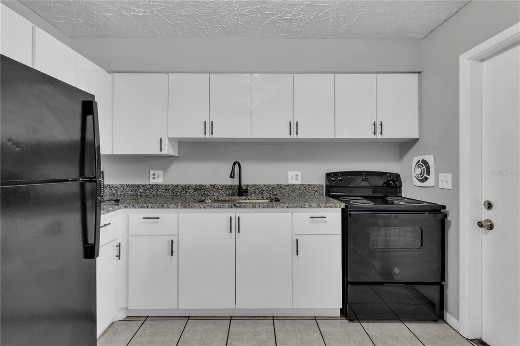 Photo of 1629 W Oak Ridge Road #1629D, Orlando, FL 32809 (MLS # S5143259)